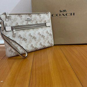 Wristlet - Coach, white and tan, never used.